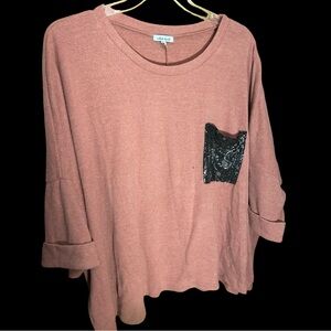 White birch, pink short sleeved sweater with‎ sequin pocket.